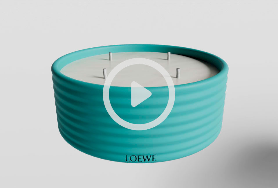 A 3D Loewe candle by Threedium, highlighting its sleek design and embossed logo.