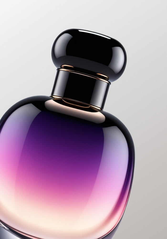 Purple and Pink Gradient Perfume Bottle with Black Cap, Luxury Fragrance.