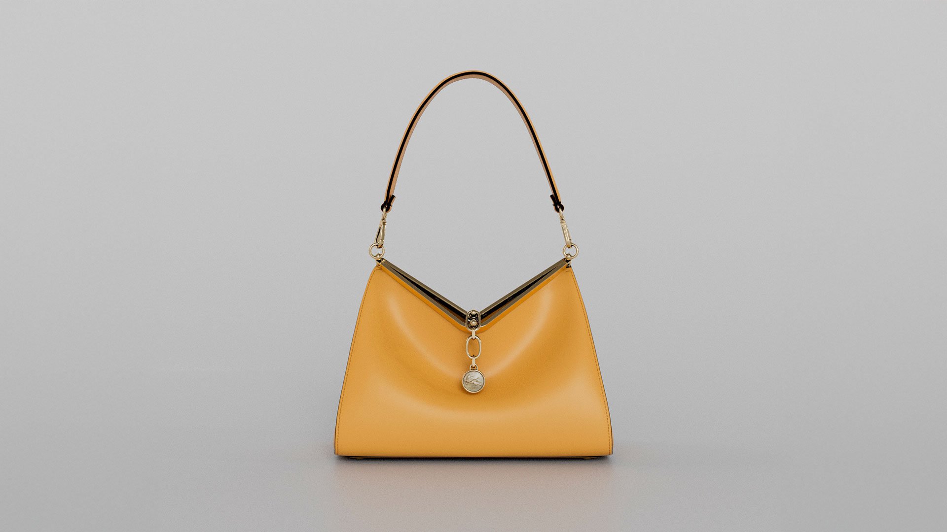 Yellow Leather Shoulder Bag with Trapezoidal Shape and Gold Hardware.