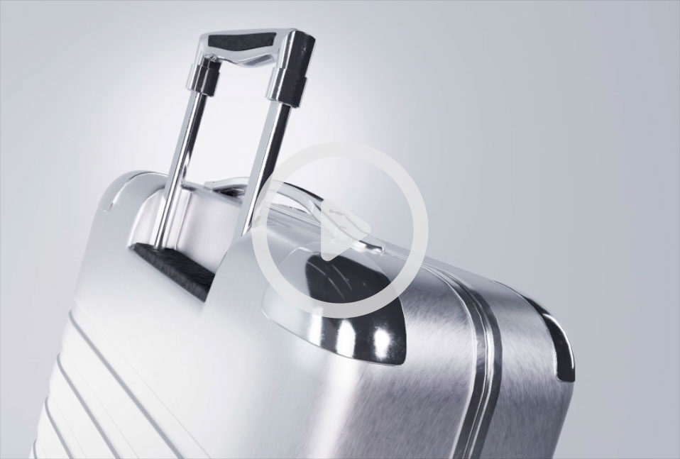 A rotating 3D view of a suitcase by Threedium, highlighting its sleek design, durable texture, and smooth wheels.